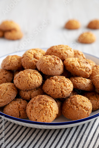 Homemade Sweet and Crunchy Amaretti on a Plate, side view. Close-up.