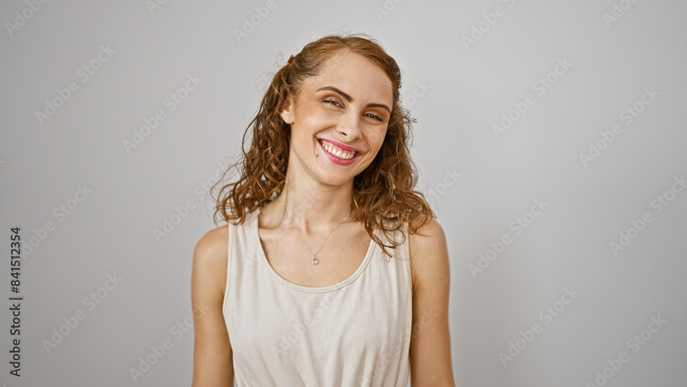 Cool, confident young woman joyously laughing and casually standing isolated, presenting a beautiful, positive expression against the white background for fun lifestyle portrait. Cool, confident young woman joyously laughing and casually standing isolated, presenting a beautiful, positive expression against the white background for fun lifestyle portrait.