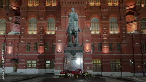 The monument to Marshal Zhukov near the Historical Museum at night timelapse hyperlapse. Moscow, Russia photo