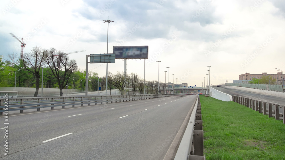 Traffic jams of roadside, transportation motion in a big city. Rush hour traffic on a city roads timelapse.