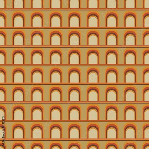 A pattern of arches in a tan and orange color