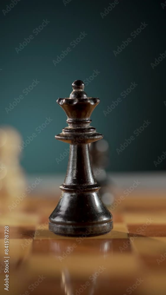 Intense action between Knight and Queen chess pieces, strategy and competition on wooden board Intense action between Knight and Queen chess pieces, strategy and competition on wooden board