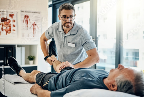 Physiotherapy, senior man and stretching for knee health, medical and consultant with injury support. Consultation, chiropractor and physical therapy with rehabilitation and care in doctor office