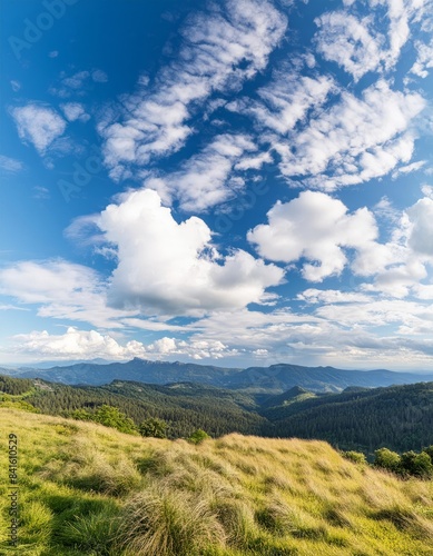 Breathtaking Panorama, Blue Sky, White Clouds, and Mountain with Trees