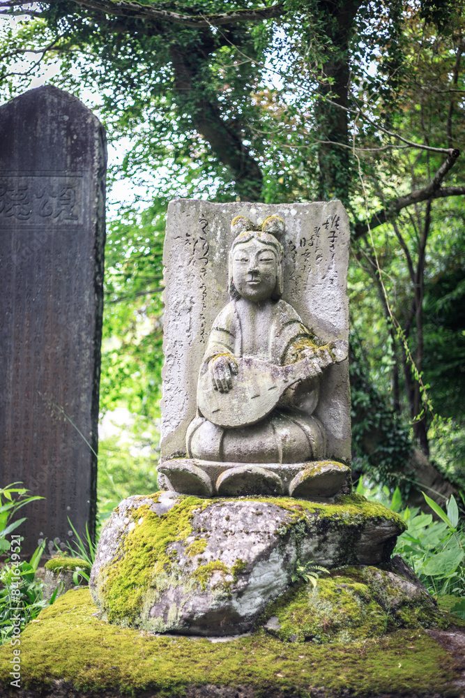 Mystical Stone Carving Amidst Verdant Forest Mystical Stone Carving Amidst Verdant Forest