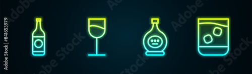 Set line Beer bottle, Wine glass, Bottle of cognac or brandy and Glass whiskey. Glowing neon icon. Vector