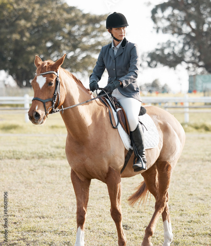 Horse, riding and woman on ranch or farm for fitness, training and event or competition. Exercise, animal and female jockey in countryside for equestrian, dressage and performance in arena in Texas
