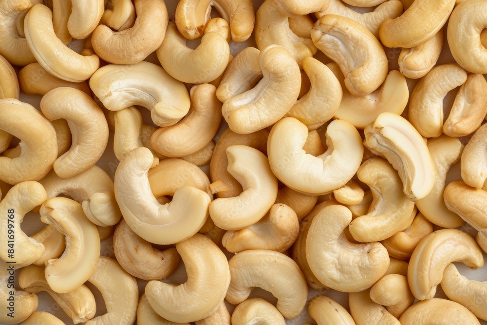 Highquality closeup of roasted cashew nuts, perfect for a background or texture Highquality closeup of roasted cashew nuts, perfect for a background or texture