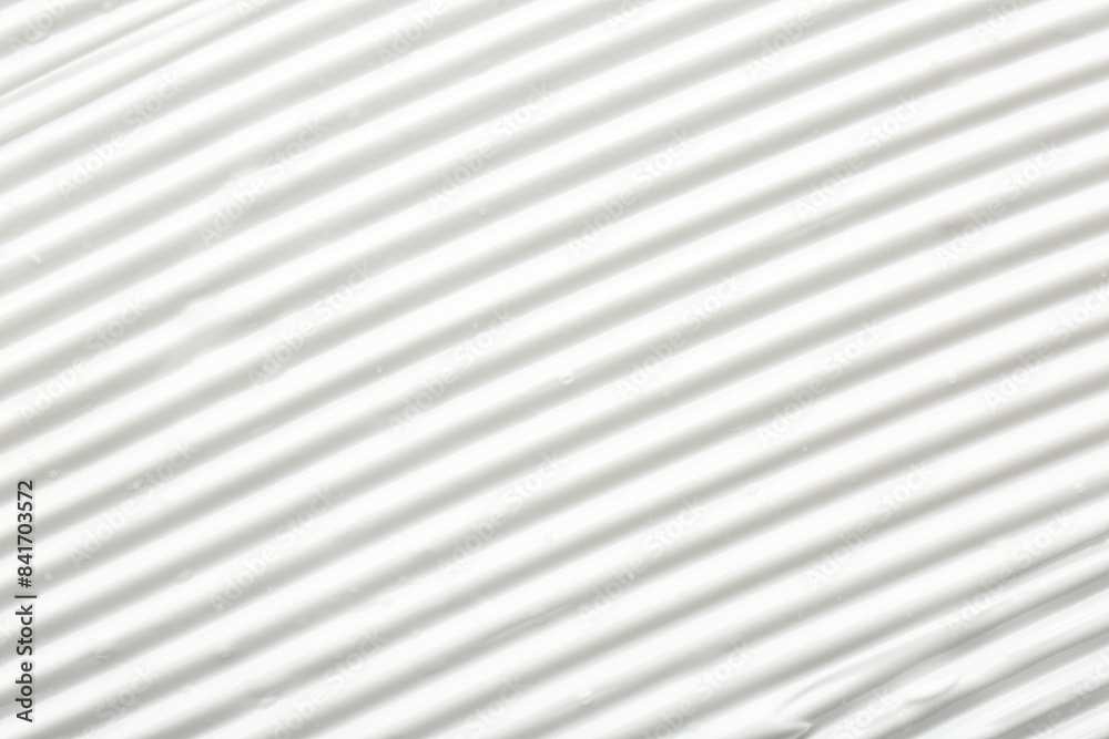 Texture of face care cream as background, top view