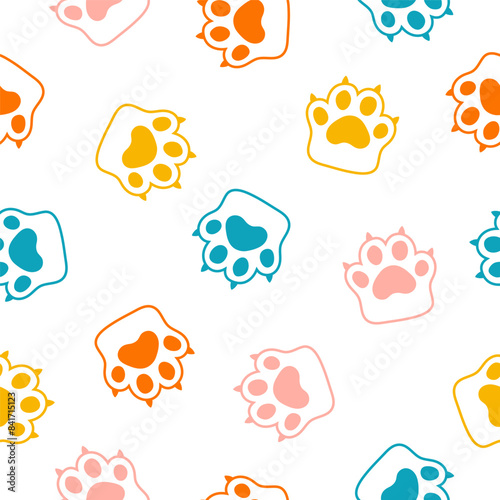 Seamless pattern with colorful paws