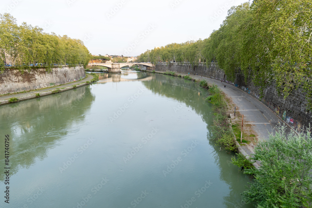 Rome, Italy - April 11, 2024: Rome, Italy - April 11, 2024: Views of the Tiber River as it passes through the city of Rome, Italy Rome, Italy - April 11, 2024: Rome, Italy - April 11, 2024: Views of the Tiber River as it passes through the city of Rome, Italy