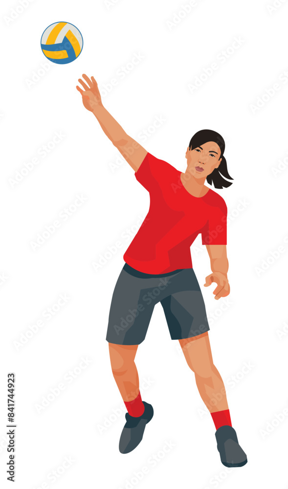 Asian women's volleyball girl players in red sports uniforms throw the ball with one hand Asian women's volleyball girl players in red sports uniforms throw the ball with one hand