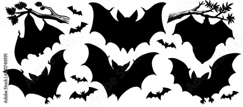A set of various vampire bat silhouettes flying and perched for halloween graphics, decorations and designs