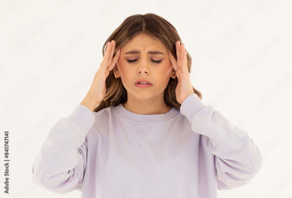 Young european woman wearing casual clothes suffering from headache desperate and stressed because pain and migraine. hands on head. Young european woman wearing casual clothes suffering from headache desperate and stressed because pain and migraine. hands on head.