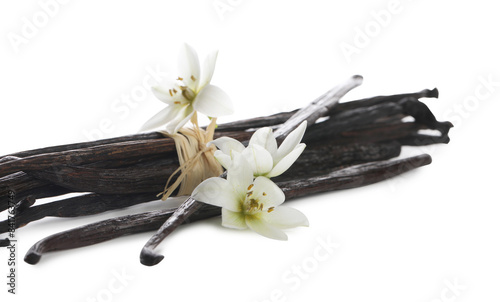 Vanilla pods and flowers isolated on white