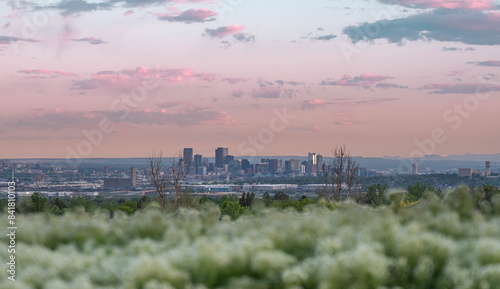 The Sunset  time in Denver , Colorado , USA  Downtown City glowing Nightscape Skyline of the Mile High City.