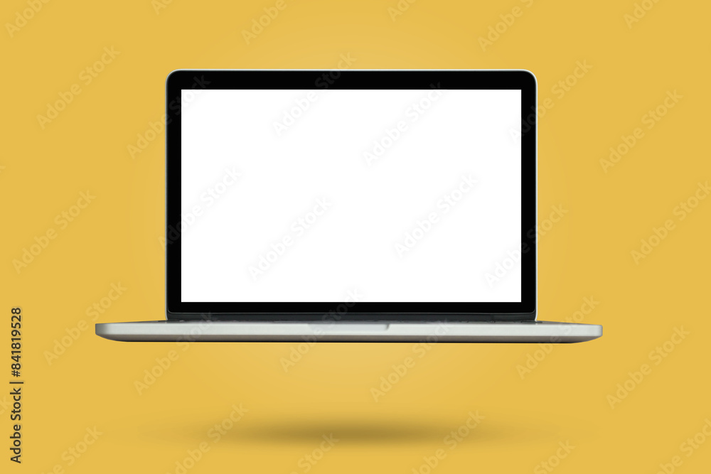 Laptop with blank screen isolated on yellow background
