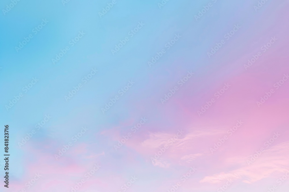 Soft pink and blue clouds blend in the sky, creating a dreamy, serene atmosphere. Perfect for a peaceful background, this image evokes tranquility and calm Soft pink and blue clouds blend in the sky, creating a dreamy, serene atmosphere. Perfect for a peaceful background, this image evokes tranquility and calm