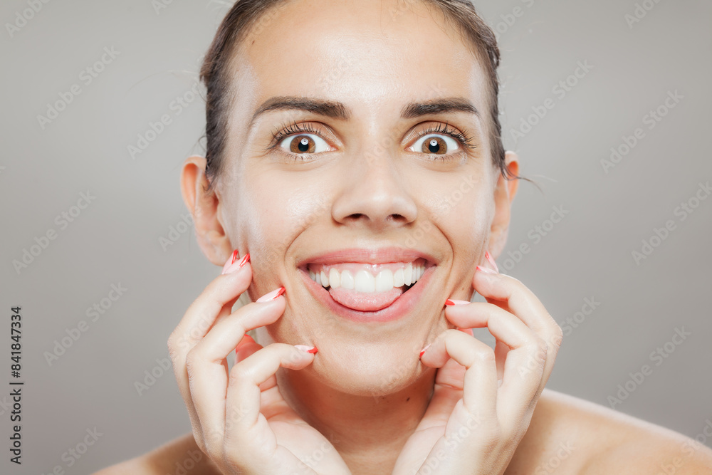 Radiant young woman with bright smile showcasing healthy skin and beauty Radiant young woman with bright smile showcasing healthy skin and beauty