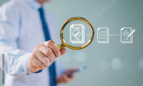 Document management service concept. Inspect check system, online document database approve, process manage file. Businessman hold magnifying glass. Audit compliance corporate business technology