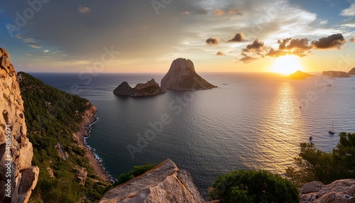 panoramic of the island of es vedra at sunset ibiza photo