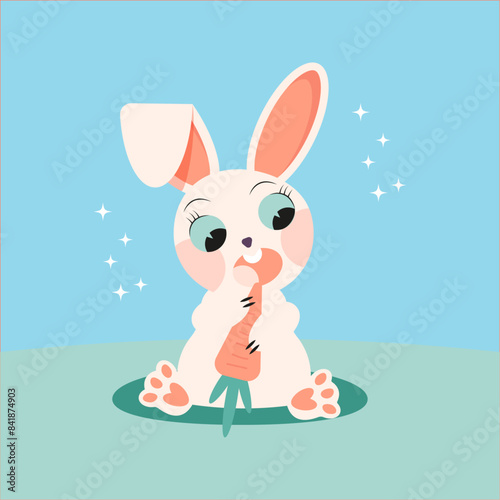 White rabbit is eating carrot