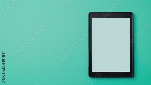 Mockup of a tablet on a solid color background, with a blank screen area for social media content