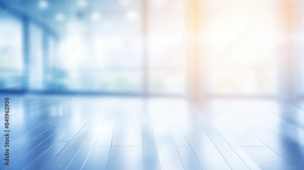 Blurred empty open space office. Abstract light bokeh at office interior background Blurred empty open space office. Abstract light bokeh at office interior background