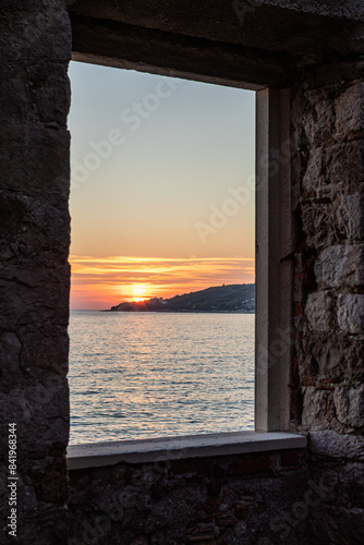 Croatian coastal sea view sunset through Balkan ocean window