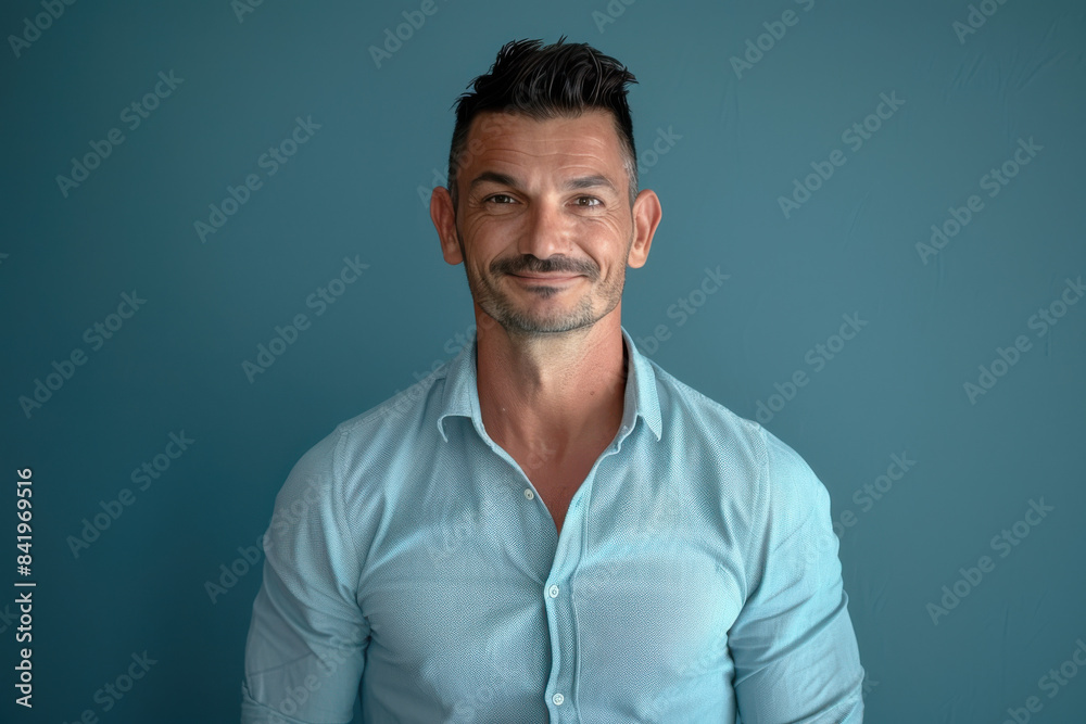 Obraz premium A close up portrait of a young man with a subtle smile