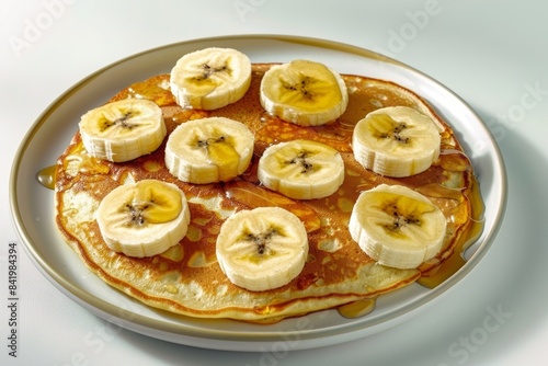 Warm Banana Pancakes with Honey Drizzle © Mayatnikstudio