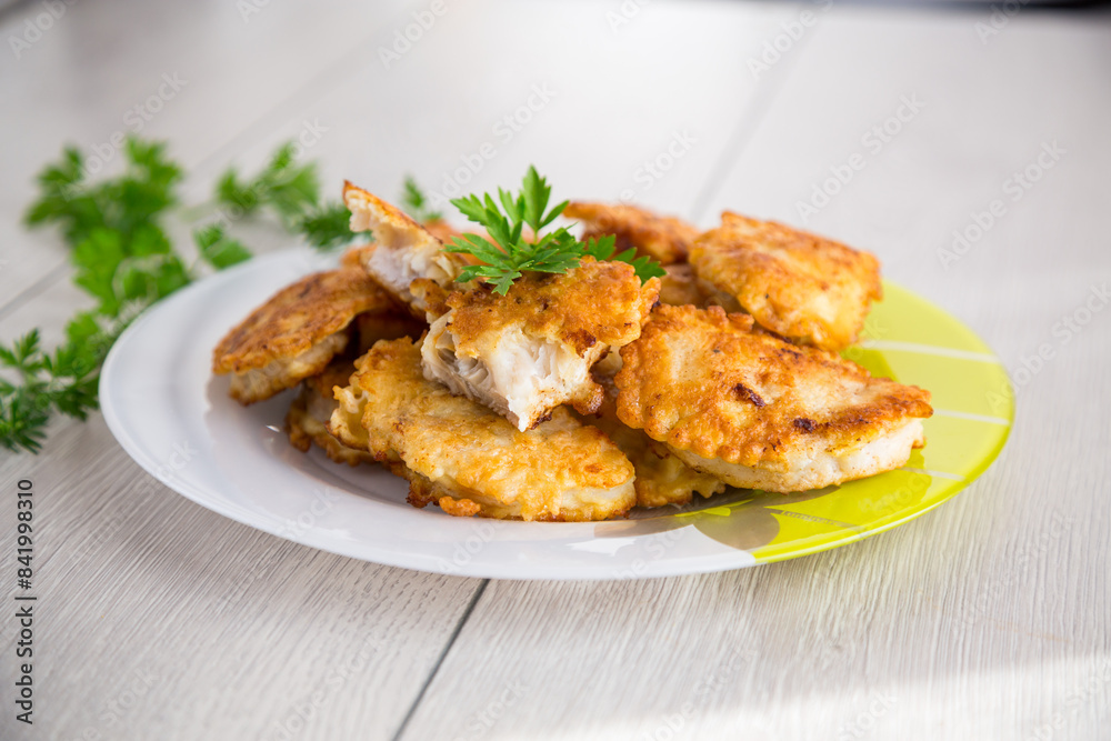 crispy golden fish fillet fried in batter crispy golden fish fillet fried in batter