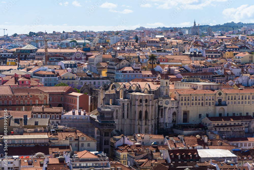 Obraz premium Aerial view of historical houses with red and coloured roofs, Lisbon, Portugal. Urban Cityscape Neighborhood. Alfama Portugal, beautiful European city