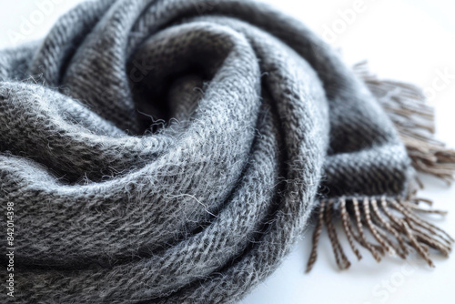 Cozy grey woolen scarf folded neatly