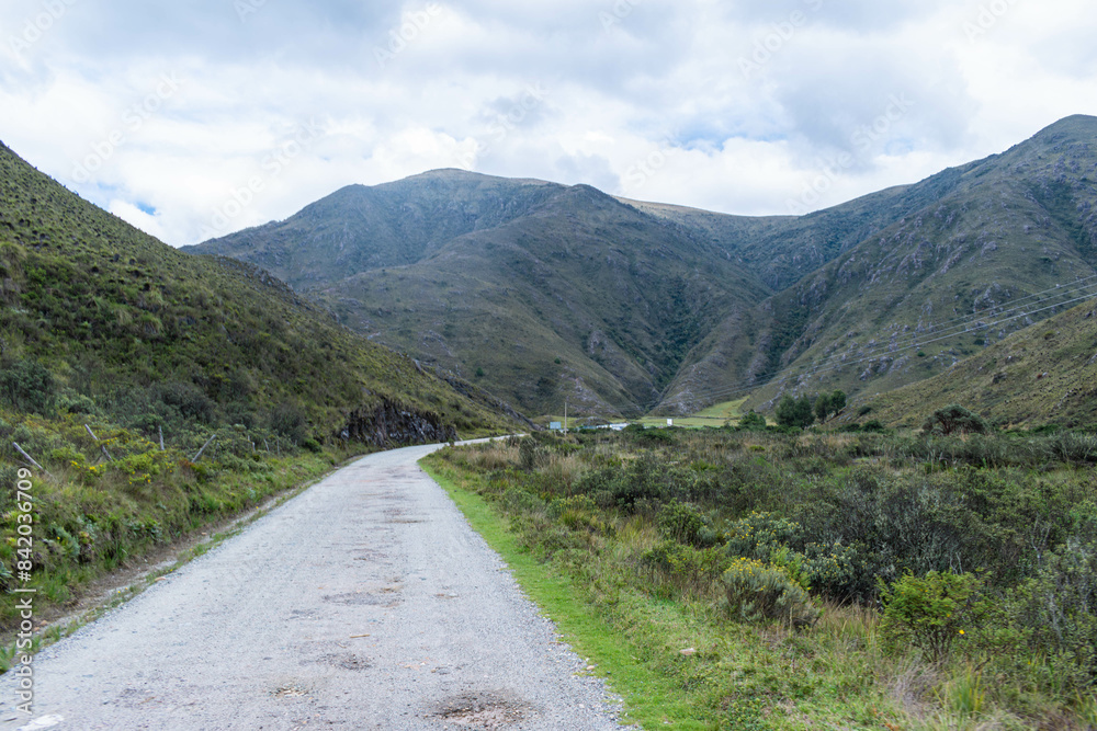 mountainous landscape with an unpaved road in the cold mountains of Colombia