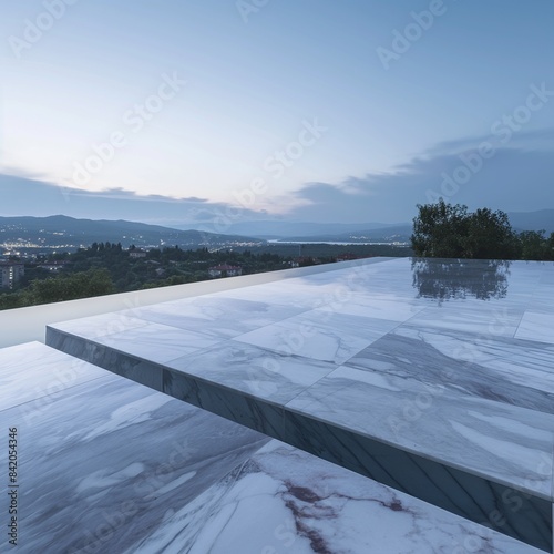 The calm surface of a seamless marble infinity pool at dusk, with the edges blending into the surrounding landscape, creating a tranquil and seamless connection between water and earth. © premium photos