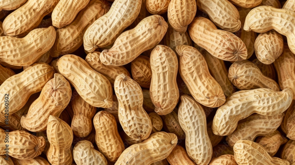 Close Up View of Shelled Peanuts in a Pile background Close Up View of Shelled Peanuts in a Pile background