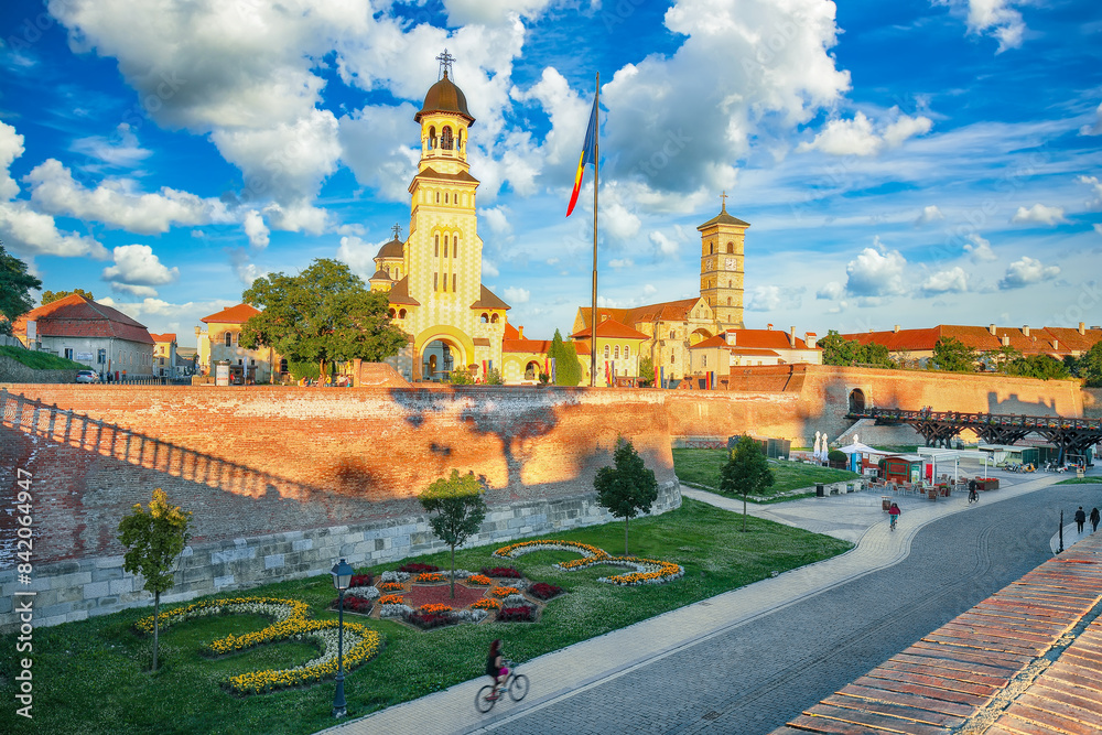 Fototapeta premium Amazing cityscape of Coronation Orthodox and Roman Catholic cathedrals inside fortified Alba Carolina Fortres