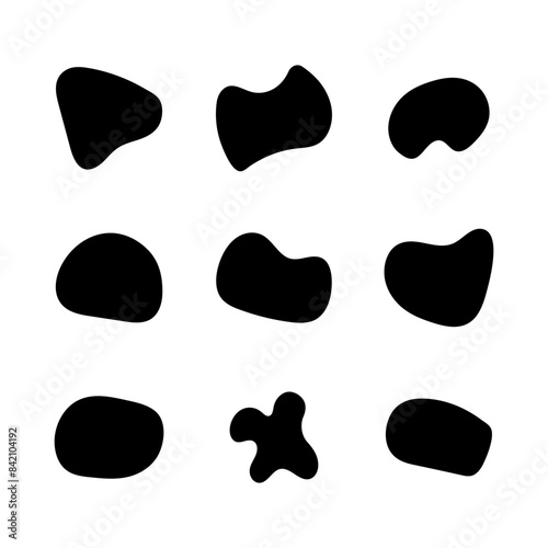 Vector liquid shadows random shapes. Black drops, simple shapes. Inkblot vector set isolate on white background.