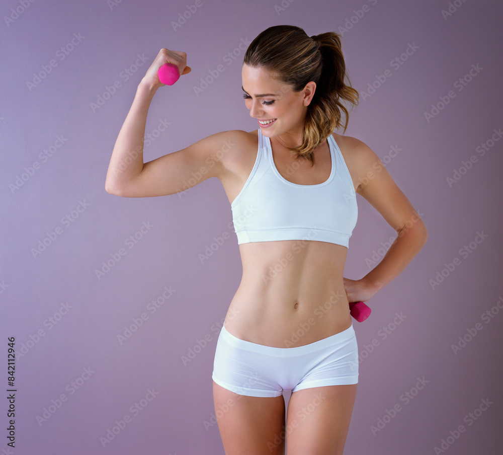 Strong, dumbbells and weightlifting woman in studio for muscle training, healthy body or wellness on purple background. Power, fitness and model with flex for challenge, arm workout or lose weight Strong, dumbbells and weightlifting woman in studio for muscle training, healthy body or wellness on purple background. Power, fitness and model with flex for challenge, arm workout or lose weight