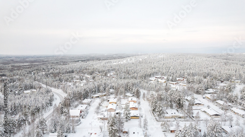 snowy hills - earial view of rovaniemi lapland finland polar circle in winter time