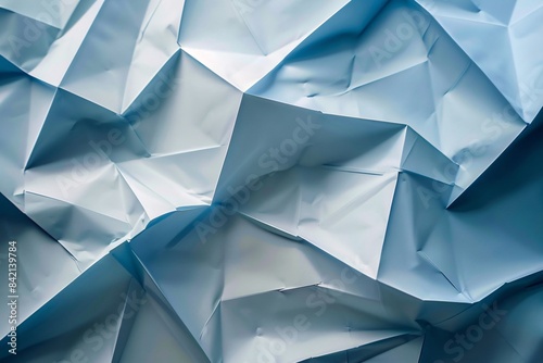 Background of a crumpled light blue paper sheet in full frame