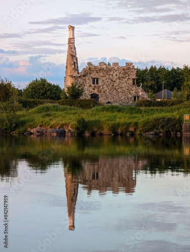 Obraz na płótnie Terryland castle reflected in Corrib river at Galway city, Ireland, historical landmark background, wallpaper w salonie