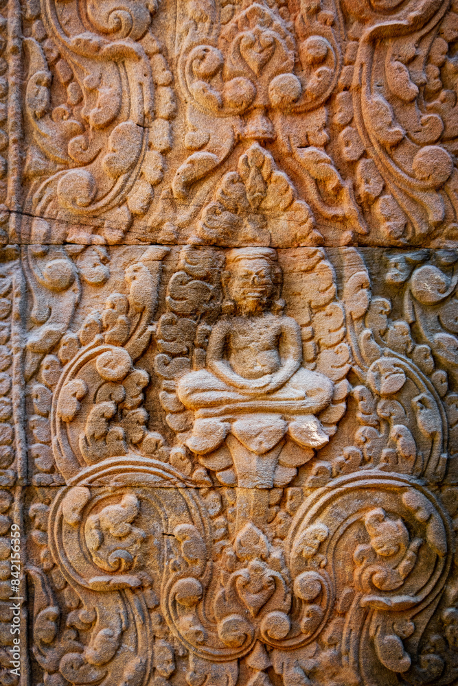 Historic rock carved statues at Angkor wat temple, Amazing architecture built in 11th century.