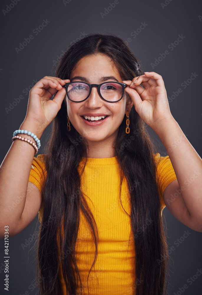 Girl, portrait and eyewear in studio for eyesight, wellness and optometry on gray background. Female person, spectacle and glasses for healthcare, frame style and lens for eye care or cosmetics Girl, portrait and eyewear in studio for eyesight, wellness and optometry on gray background. Female person, spectacle and glasses for healthcare, frame style and lens for eye care or cosmetics