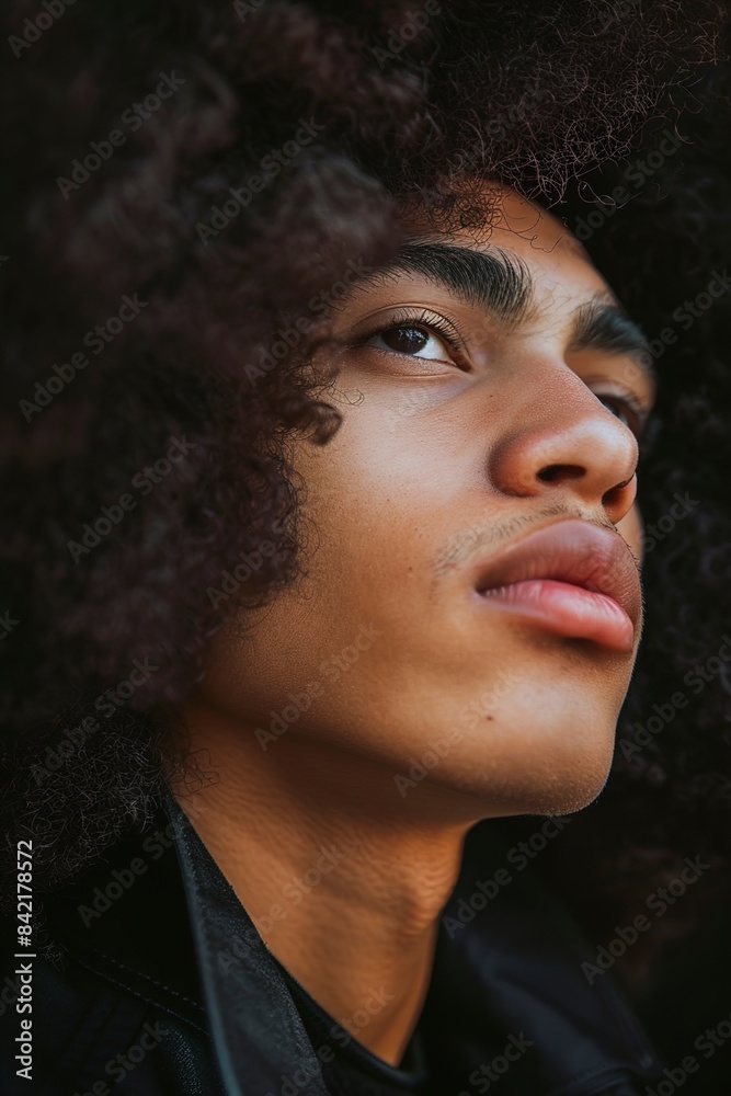 A Young man wearing afro hair A Young man wearing afro hair