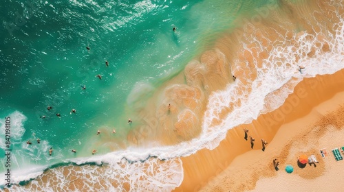 Aerial view of people at the beach enjoying summer