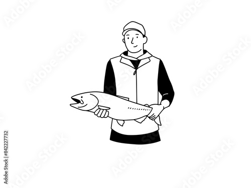 Male fisherman catching fish