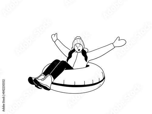 Happy young woman with snow tubing