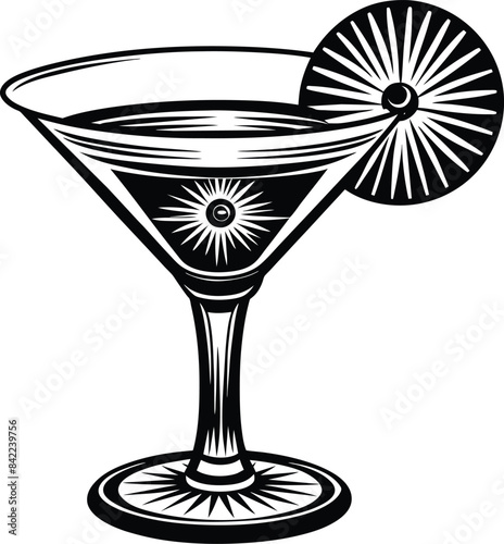 martini glass with olives isolated on black